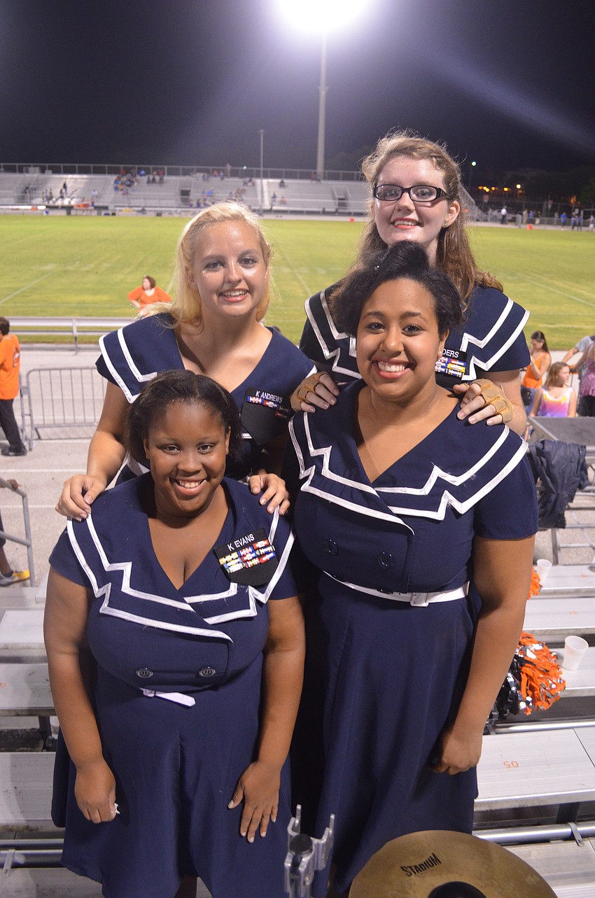 Color Guard members and seniors Kamika Evans, Kianna Andrews, Ladestenee Orser and Lacey Landers