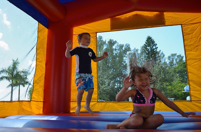 Brynn and Blake DeJongh have a great time jumping in the jumping gym.