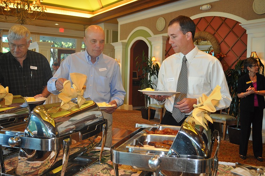 Lynn Quartermaine and his son Sam get breakfast