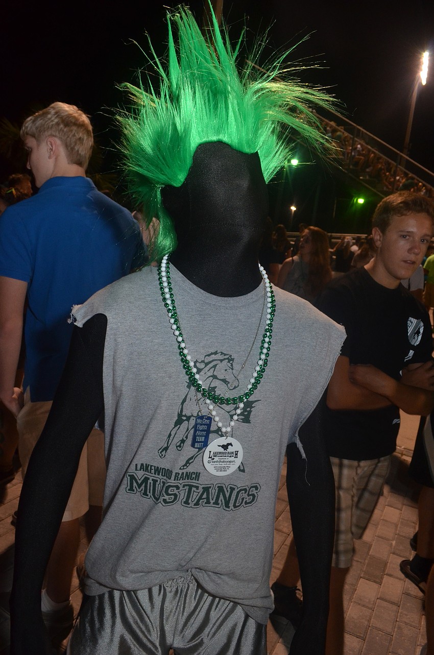 Chris Proffitt, 15, shows school spirit at the homecoming game.