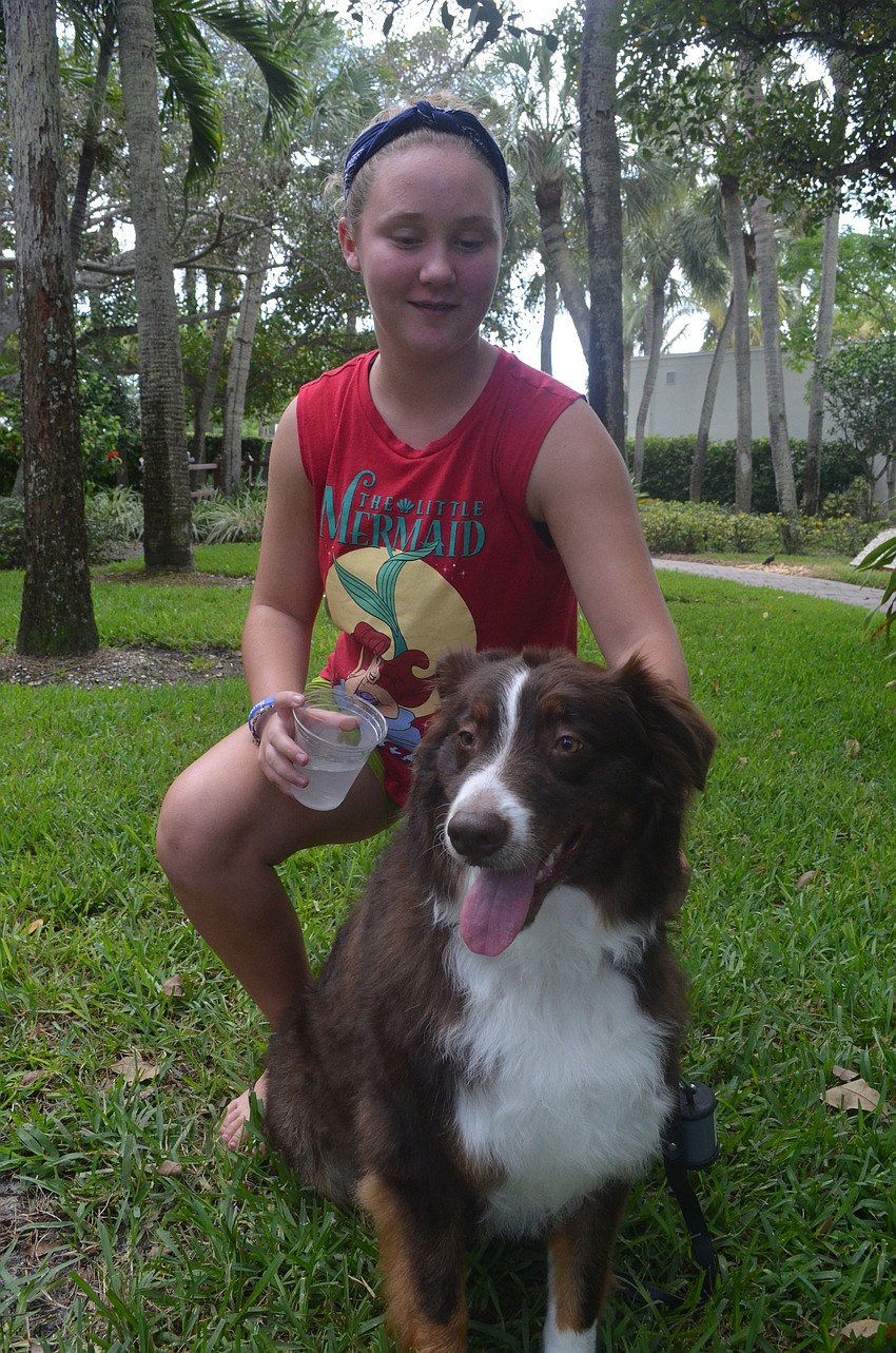 Mary Bernthal, 12, and her 3-year old Australian Shepherd Jack