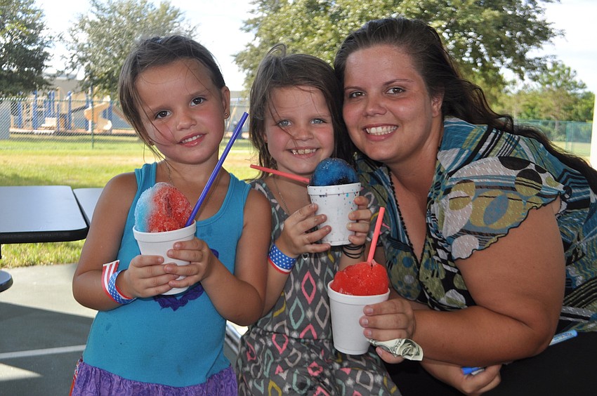 Sharon, Taylor and Davida Lockwood cool off in the shade