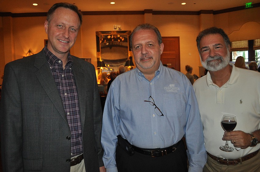 Blaise Bright and Mark Grigoli of John Cannon Homes and Peter Mason of Lee Wetherington Homes