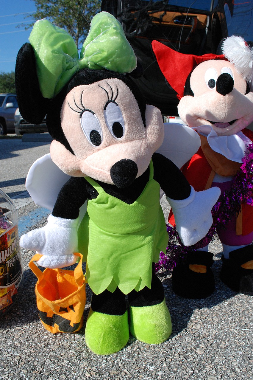 Parents tailgating in Lakewood Ranch Baptist's Trunk or Treat competed for the best decor. Mickey Mouse was among the morning's themes.