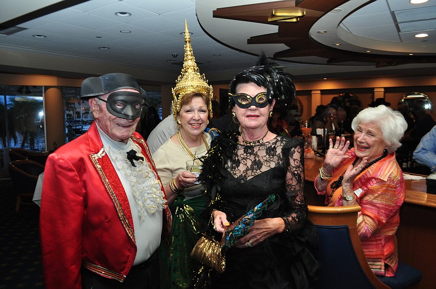 Jack Jaret, Kathleen Powell, Sally Jaret and Thea Phillips play dress up.