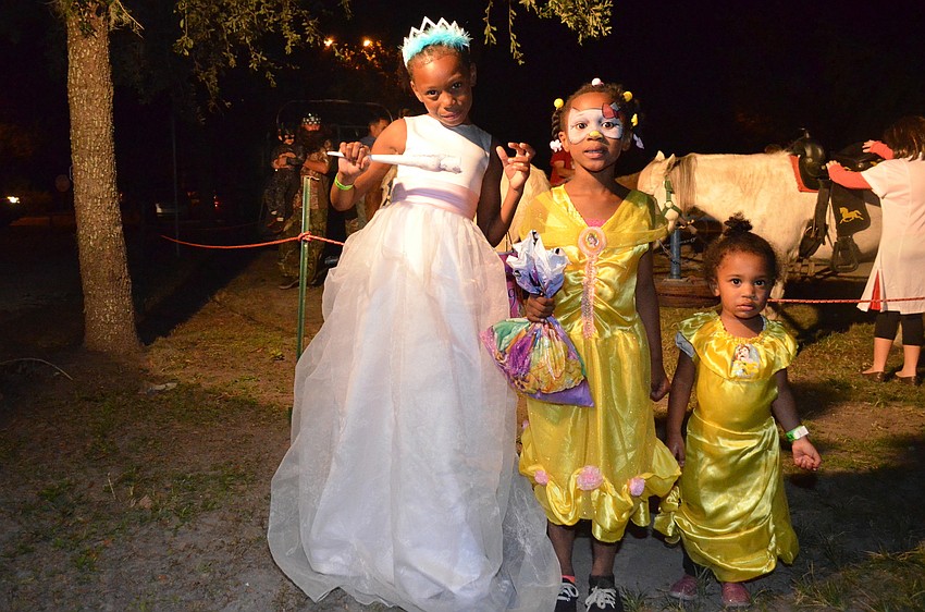 Kamerra and Tiana Clark with Kylah Lewis