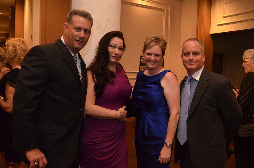 Mike and SherriÃ© Tutcher with Sarah and Marc Soss