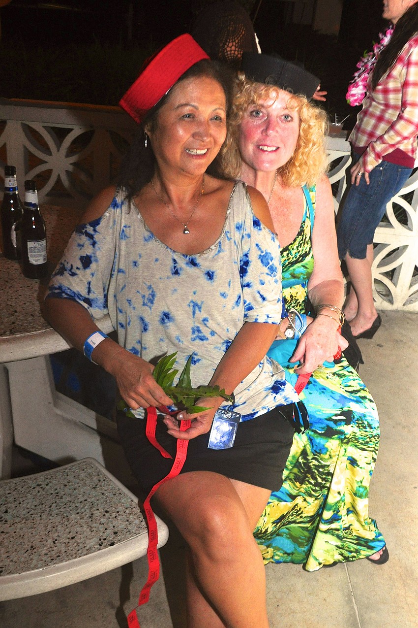 Gal pals Tammy MacBride and Patty Donovan enjoy laughs together.