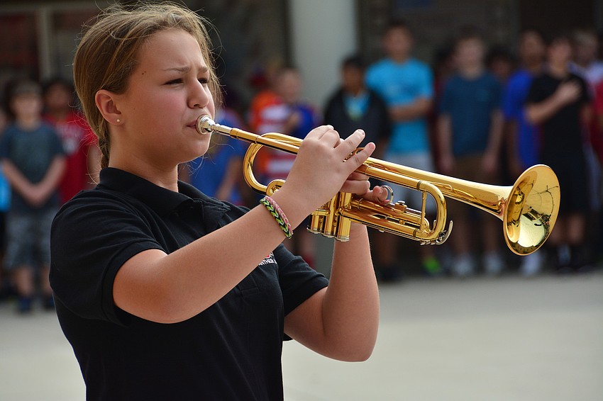 Erin Waters played taps to conclude the ceremony.