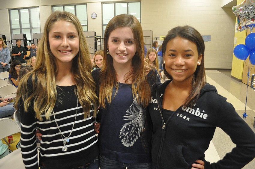 Eighth graders Kendall Wilson, Natalie Solla and Ali Kelley