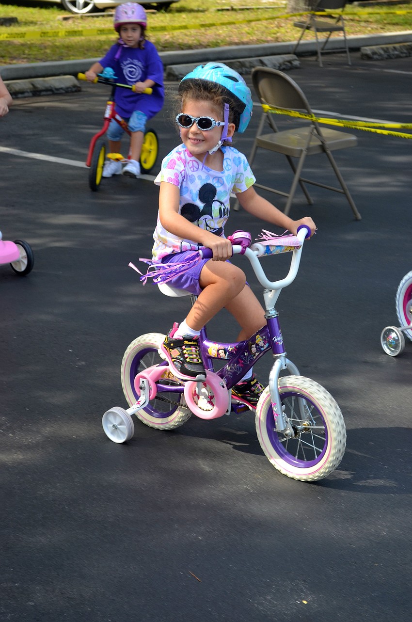 Chiana Webber, 4.5, poses and smiles for her mother.