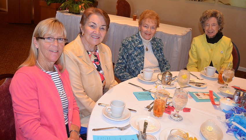 Stephanie Lundy, Monique Nadeau, Betty Stokes and Lenore Horner share small talk.