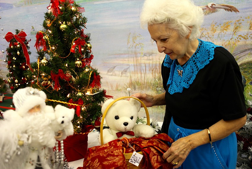 Anna Marie Johnson, of Pennsylvania, enjoys the bazaar while visiting her sister in Longboat Key.