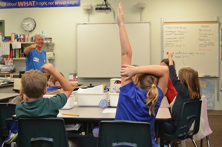 The students eagerly answer Spinellaâ€™s questions during his presentation.
