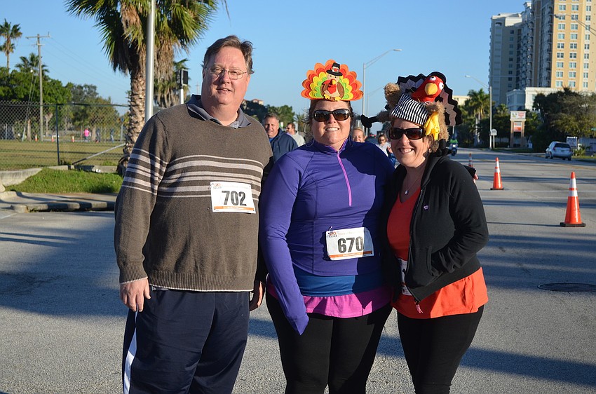 Runners pound the pavement for the Turkey Trot 5K.