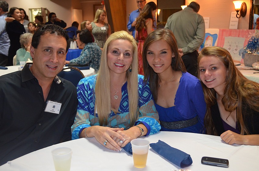 Ian and Melissa Howard with Alena and Anna Barwich