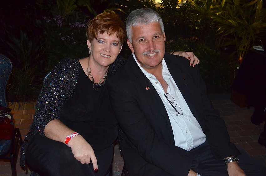 Debi and Rudi Kleer cozy up near the fire.