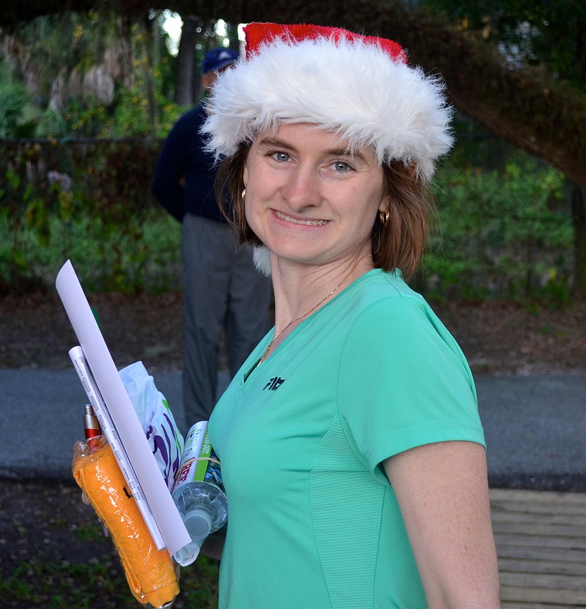 Laurel Audet shows off her Santa hat before the race.