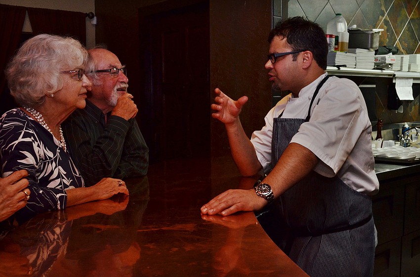 Syma and Jay Cohn talk with Chef Darwin Santa Maria