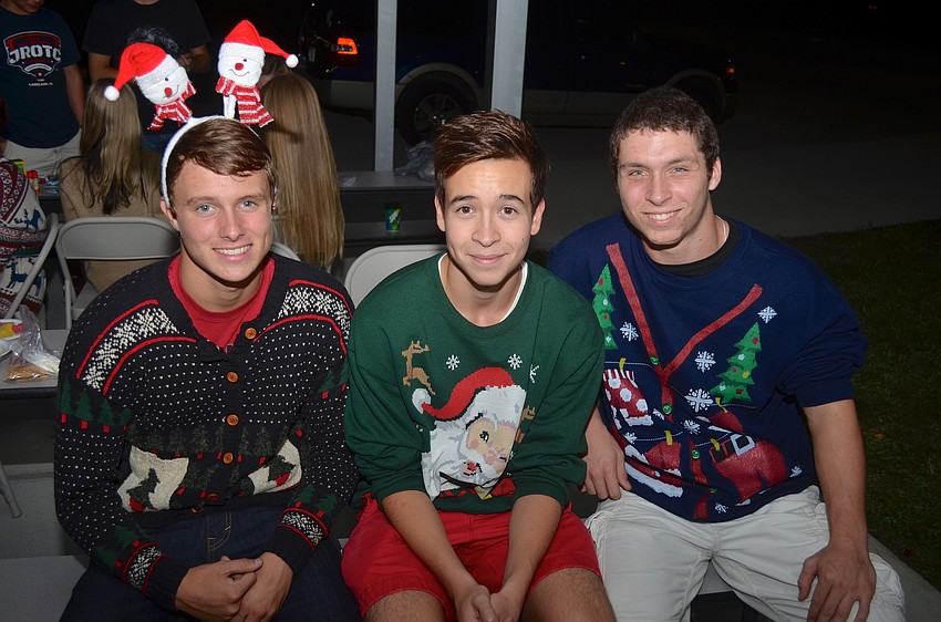 Sixteen-year-olds John Graves, Lucas Mingote and Andrew Garcia show off their holiday gear.