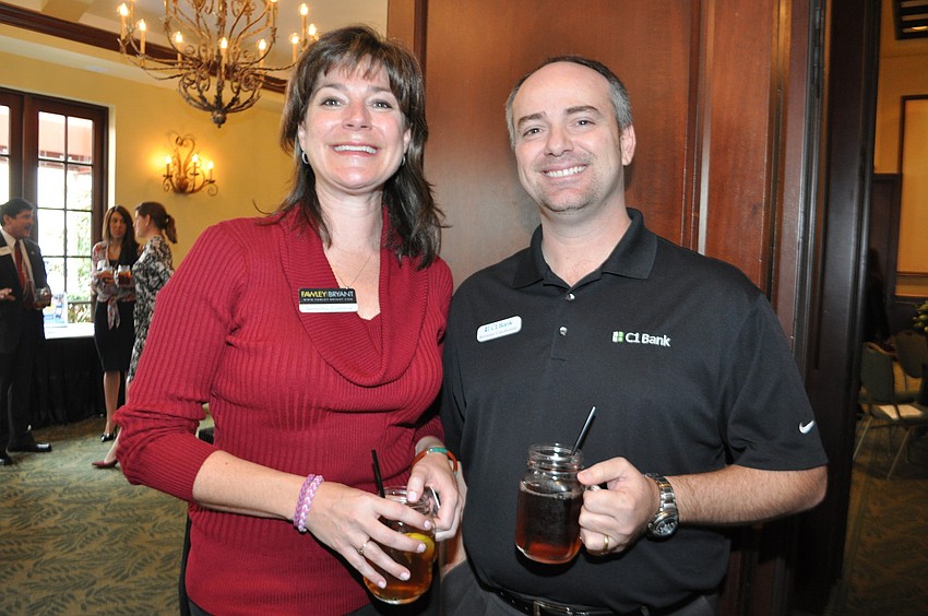 Samantha Cummins, of Fawley | Bryant, with Brenner Cavalcante, of C1 Bank