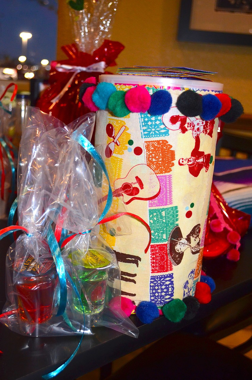 Participants enter for a chance to win a variety of prizes, including Godiva chocolate baskets.