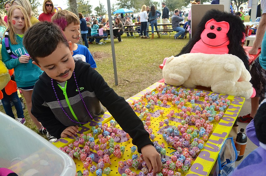 Julian Vasquez-Cruz picks out the perfect lollipop.