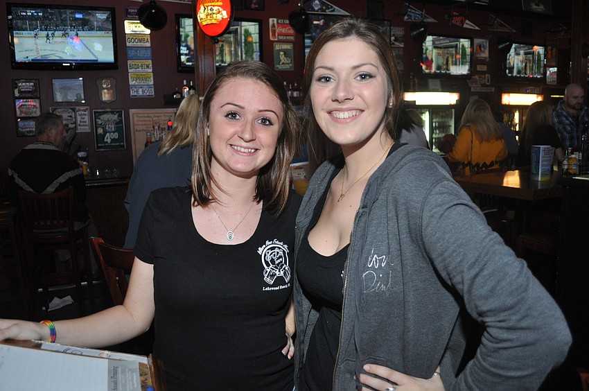 Stepheny Towler, an Edâ€™s Tavern waitress and Melinda Durr, a hostess at the restaurant