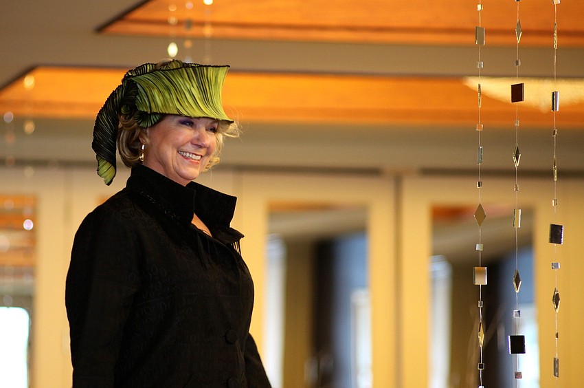 Lynn Hayes fashioned her scarf into a hat.