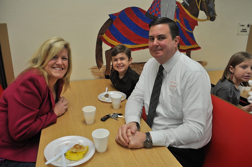 Monica, Ty and Kevin Moore are all smiles.