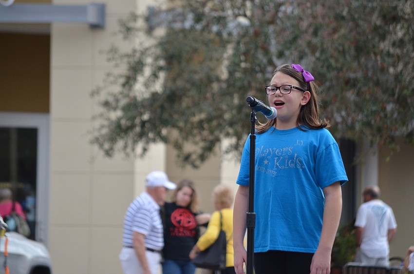 Lily Mancini performs with Players Kids