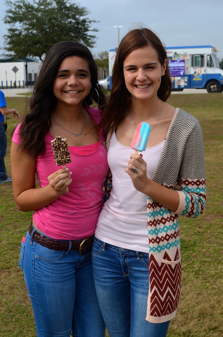 Rachel Levy, 13, and Daniella Castrogiova enjoy time outside during the school day.