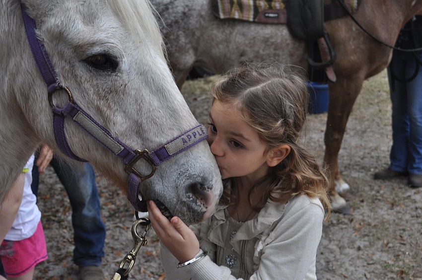 First grader Lillyana Mencinsky kissed a horse.