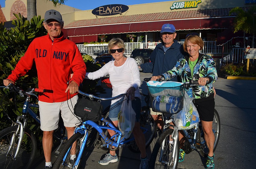 In the village, Patrick and Beverly Hanley with Charles and Brenda Hooper rode their bikes to the beach for a picnic.