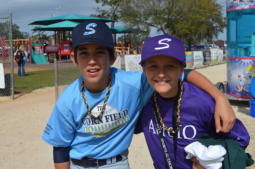 Adam Porter and Clay Colby hang out after a game.