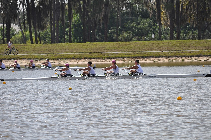 Sarasota Crew members compete in the mixed quad event.