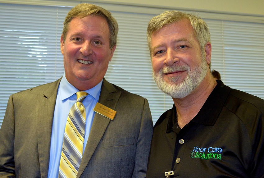 Michael Doll, Longboat Key Financial Group, and John Cozy, Floor Care Solutions