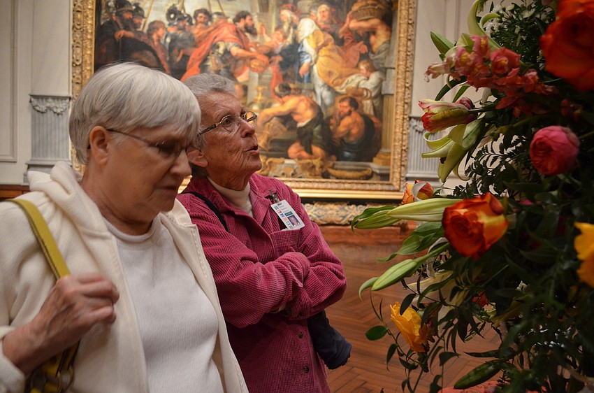 Pat Haberl and Sheila Fleischer admire the large Gallery 2 bouquet.
