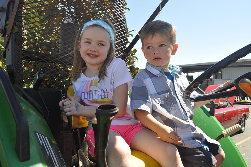 Cami and Grady Sandhoff posed on a tractor-trailer.