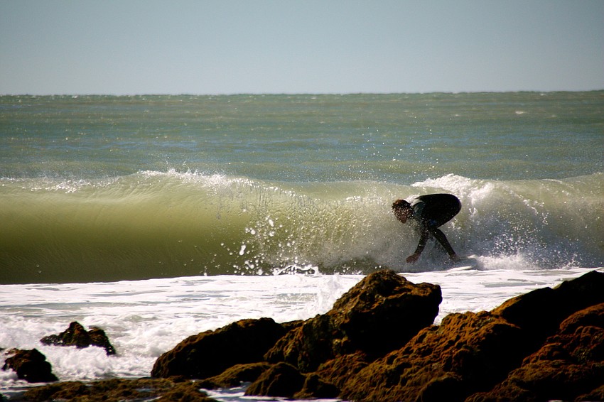 Surfers at Lido Beach.