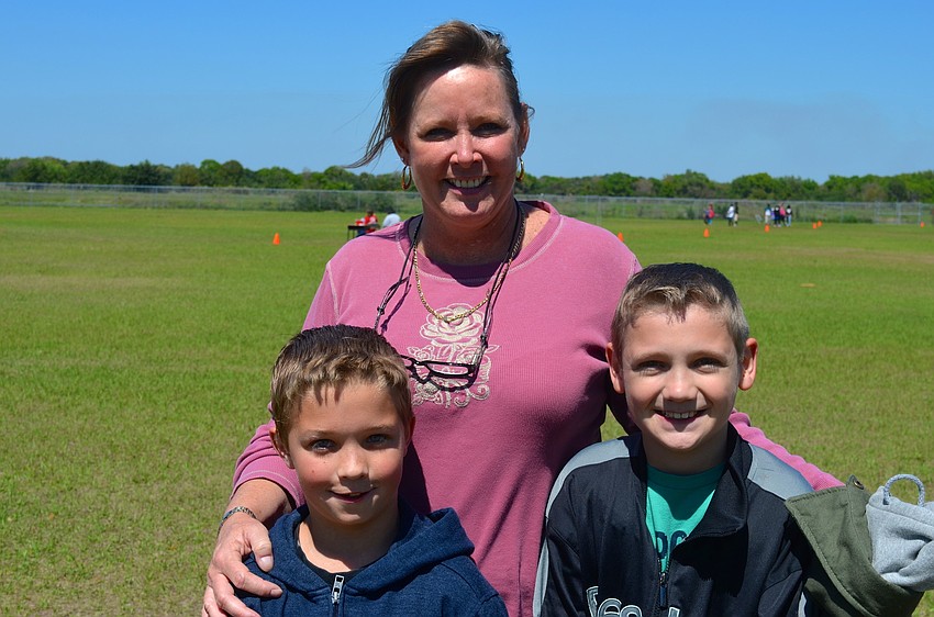 Pam LaPlante, with Nathan Spence, 11, and Aaron Conway, 12.