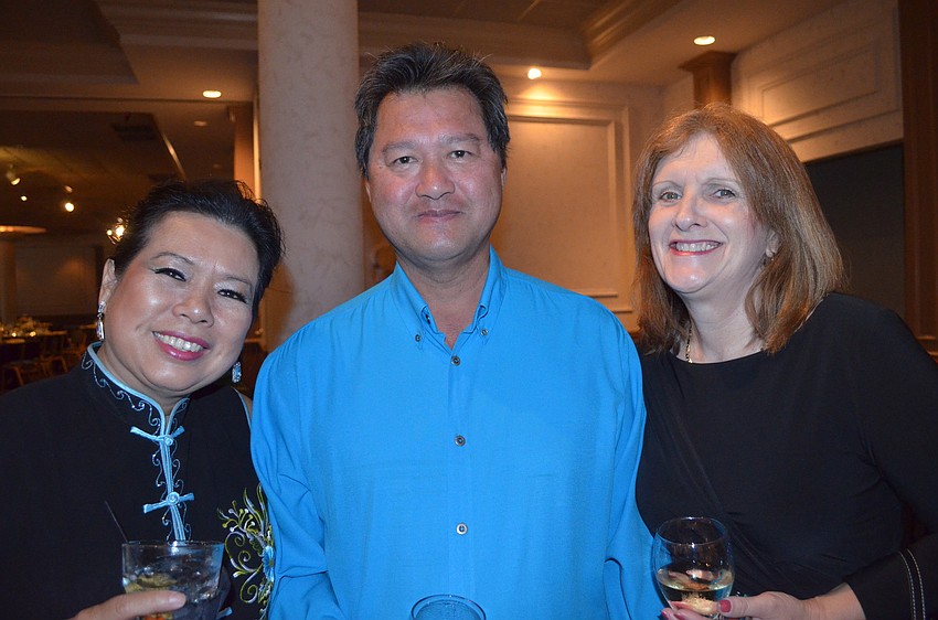 Irene Leung, vice city director of Xiamen, China with Clement and Patricia Tan.