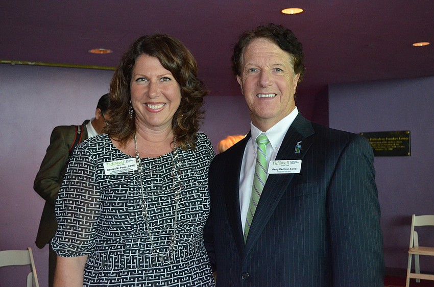 Lecture Sponsors and Tidewell Executive Vice President Denise Pope and President and CEO Gerry Radford.