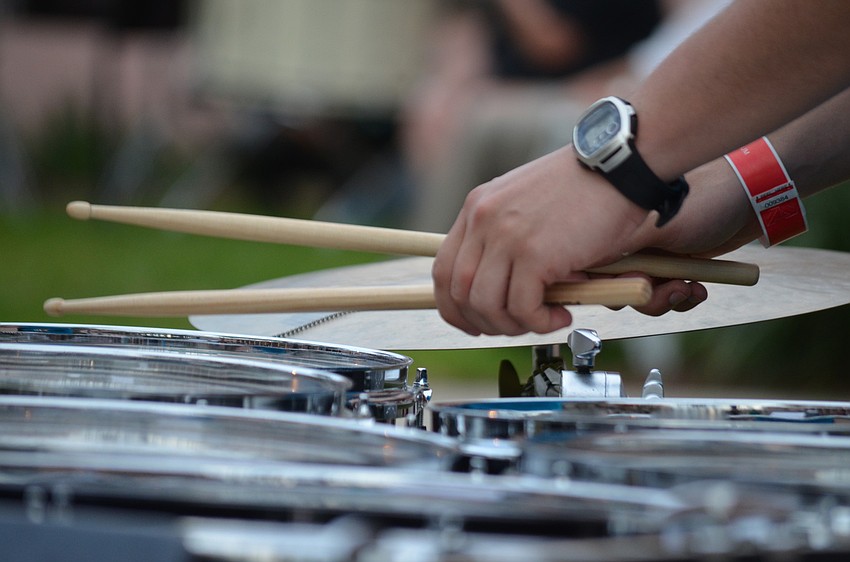 Sixty students from four colleges participate in Inuksuit