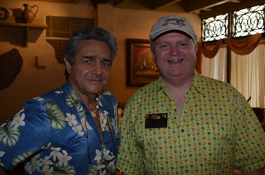 John Masters and Joe Sikora wear Hawaiian shirts.