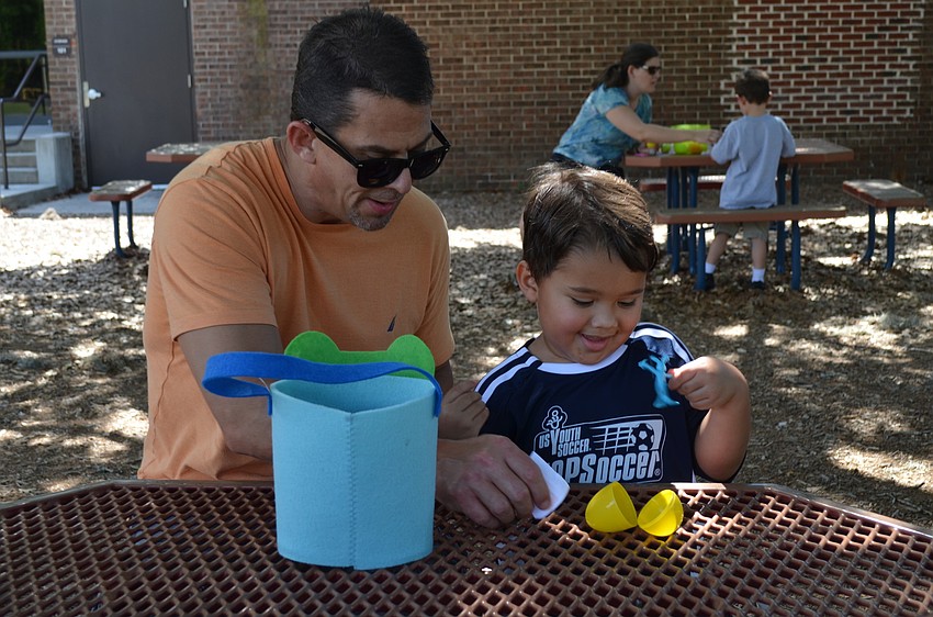 Andy and Spender Morris open their eggs.