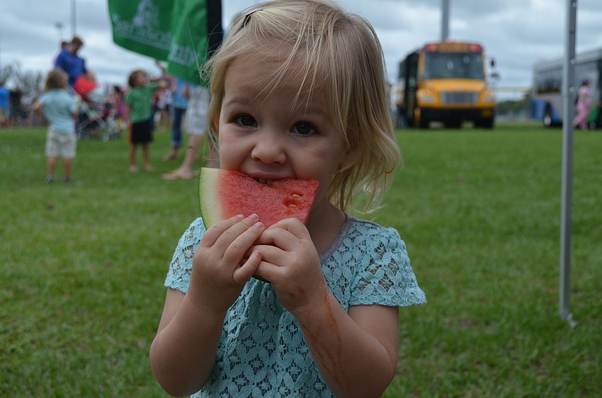 Brynn Heyman enjoys a watermelon.