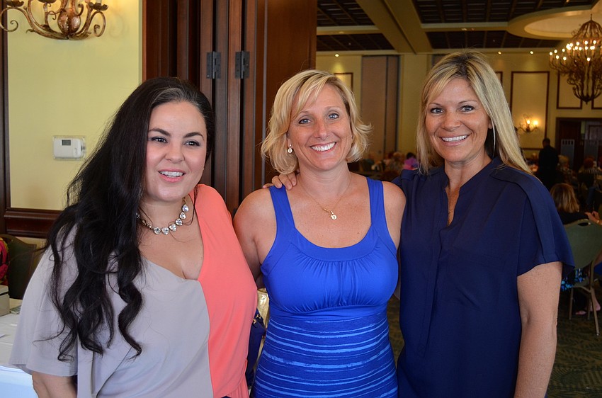 Michelle Snyder, Ninette Celender and Stacie Baer enjoy dressing up.
