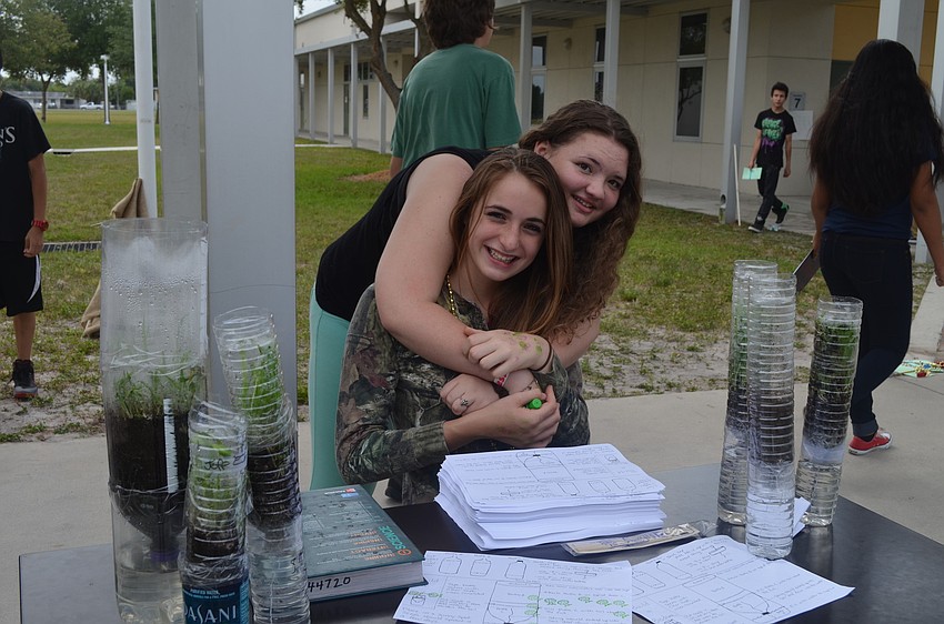Grace Robards and Angel Metz with their biodomes.