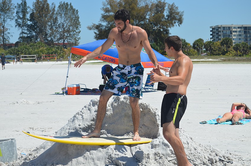 Greg Ratzel and Lukas Labanauskas create their sculpture.